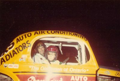 Howard Shaw
Howard Shaw taking a fan for a ride in Tony Blake's stock car
Keywords: Kingston_Speedway Dirt_track Stock_car Howard_Shaw